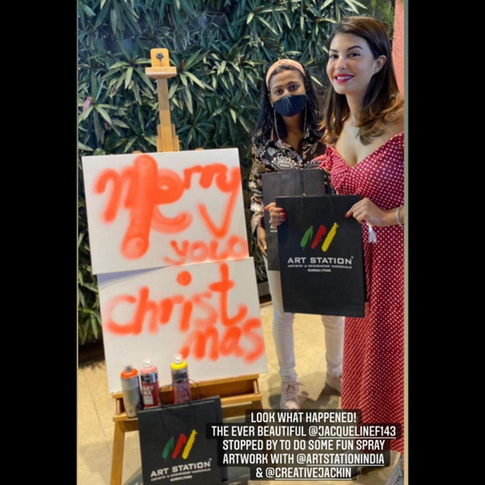 Jacqueline Fernandes With Artwork done using Cosmos Spray Paints
